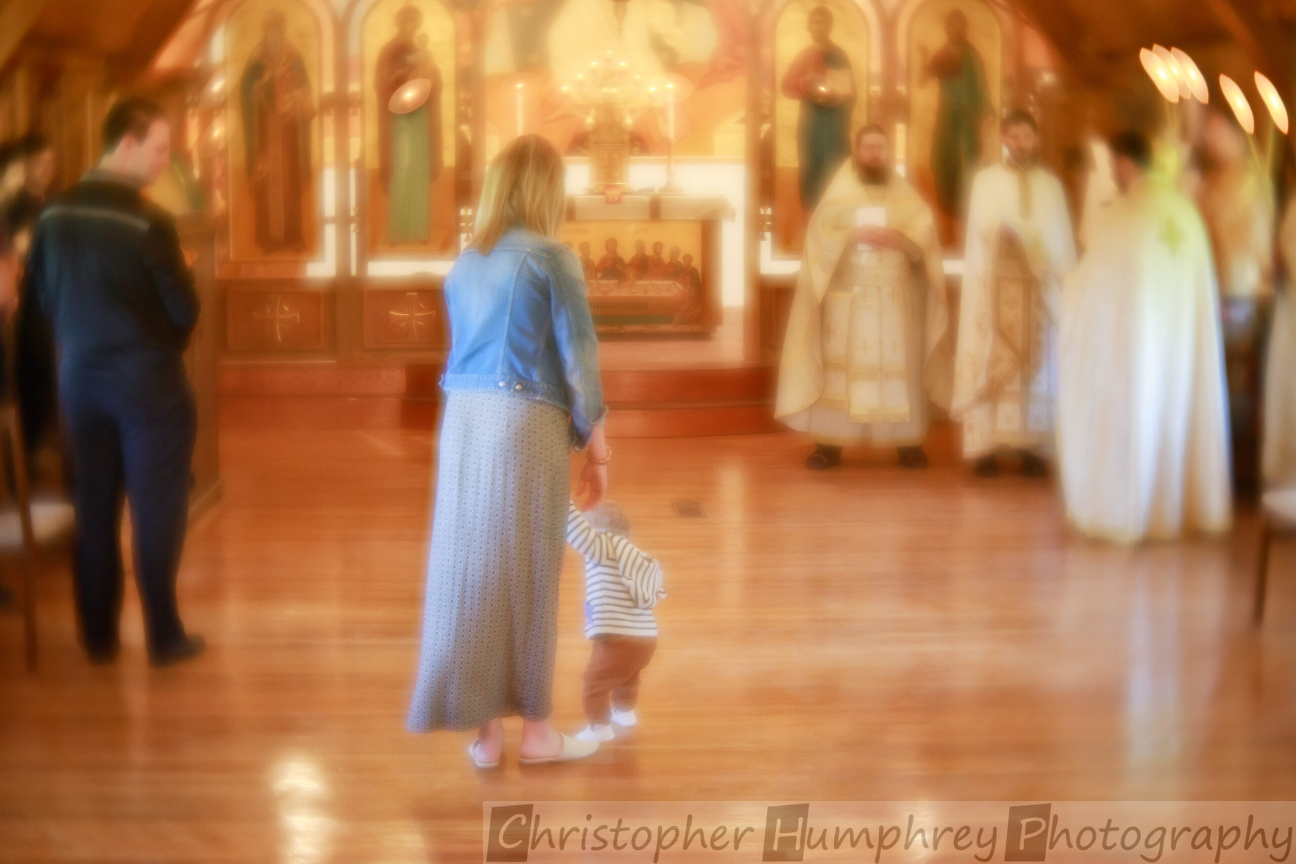 Woman and child at Orthodox Christian Divine Liturgy